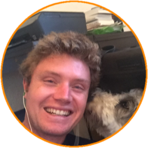 Eliot Peper headshot with puppy