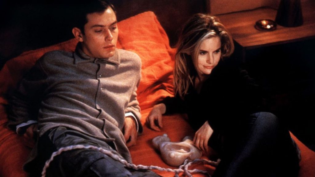 eXistenZ movie backdrop fleshy nipple pod with umbilical on bed